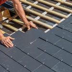 a professional installing slate roof